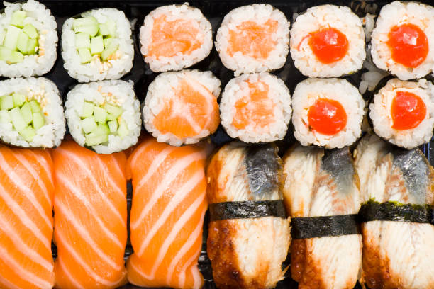istock Sushi set on the table, Seafood and vegetables. Close-up and macro 1252929961