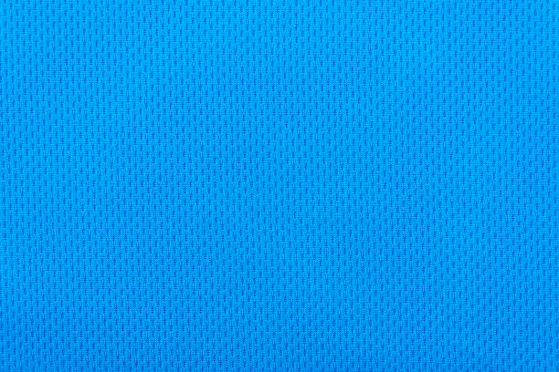 배경이나 질감으로 파란색 폴리 에스테르 스포츠 티셔츠의 매끄러운 표면 - jersey 뉴스 사진 이미지