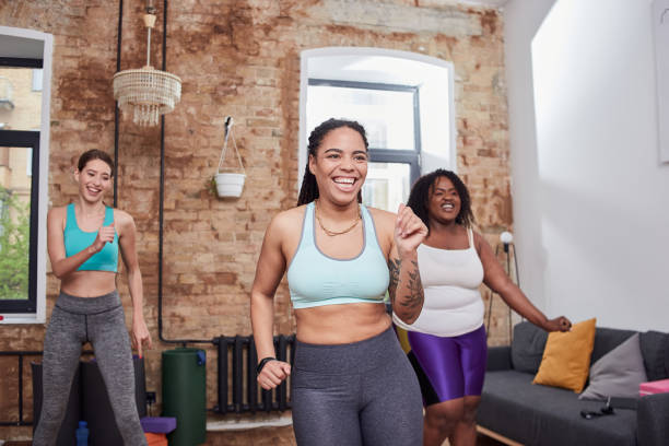 istock Three active young ladies friends training indoors 1252950315