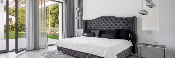 istock Elegant and glamorous bedroom, panorama 1252950386