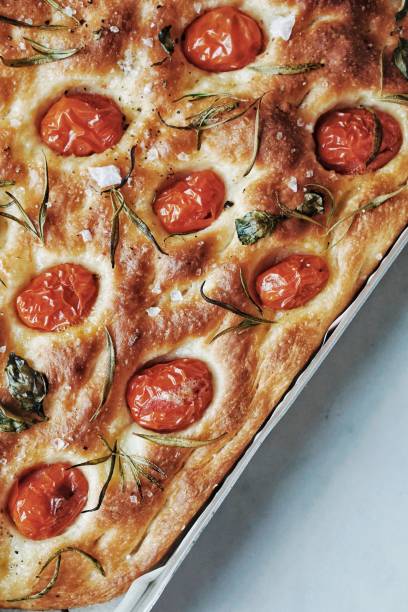 istock Foccacia Italian bread with tomatoes and herbs 1252951548