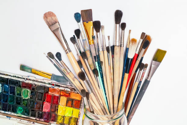 istock Artistic watercolors and brushes. 1252952498