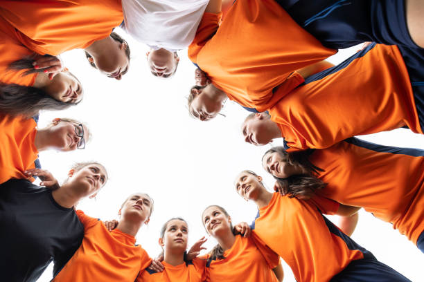 istock Low angle view of female soccer team 1252955004
