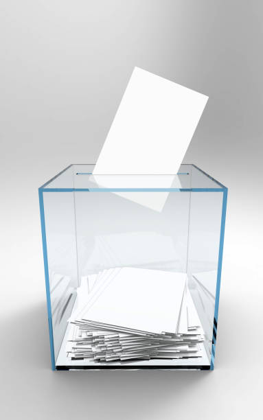 istock Transparent ballot box with voting paper in hole 1252957527