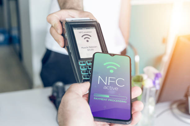 Contactles Payment with Mobile Phone NFC technology stock photo