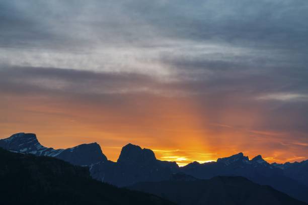 istock Orange Colored Sunset Sky Canadian Rocky Mountains 1252962755