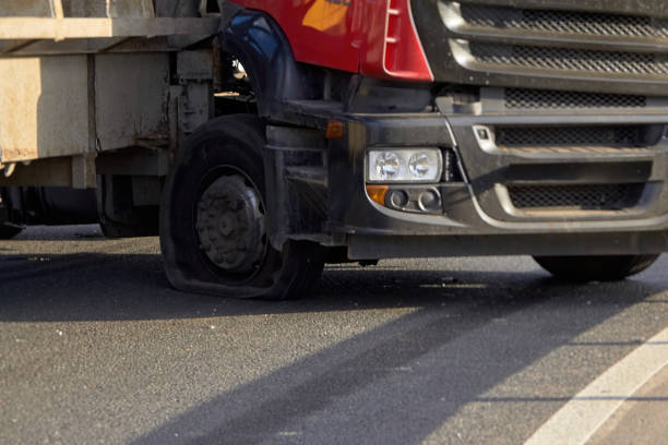 istock an exploding truck wheel caused an accident on the road 1252963773