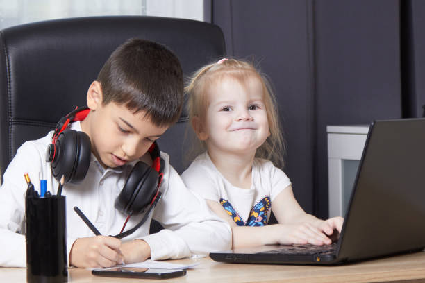 istock boy with headphones remote study at school 1252966143