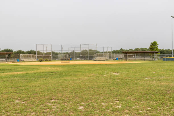 istock Center Field View on Empty Florida Baseball Field 1252969597