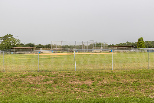 Recreational baseball field in a suburban Florida park.