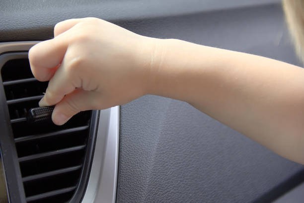 istock small baby hand in the car arcade game learning how to do it 1252970083