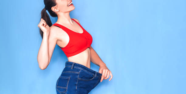 istock Slim woman in jeans 1252975327