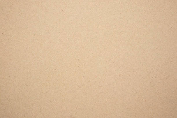 istock Brown paper eco recycled kraft sheet texture cardboard background 1252975403