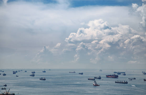 istock Cargo ships waiting to enter in the port 1252976757