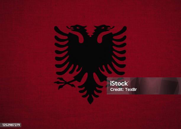 Albania Flag In Texture Of Fabric Stock Photo - Download Image Now - Police Force, Albania, Currency