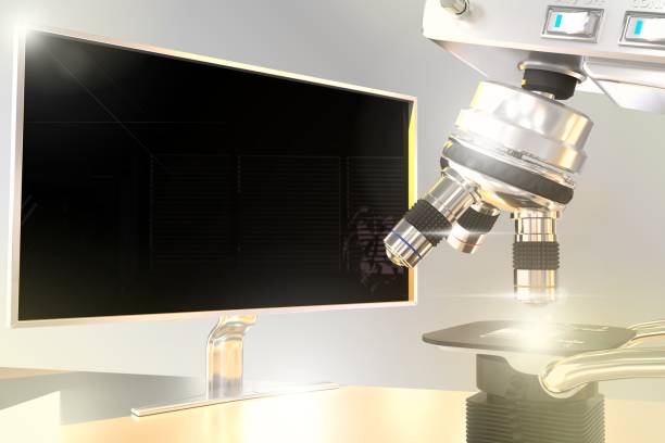 istock bacteria analyzing concept, laboratory modern microscope and monitor with blank space for your content with flare on gradient background - object 3D illustration 1252987924