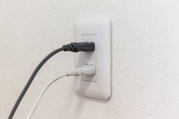 istock Electric outlet and power plug 1252993394
