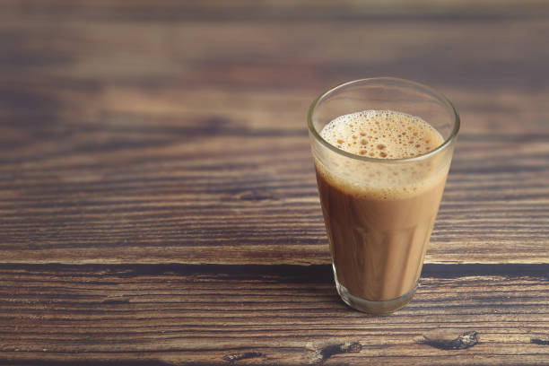 istock Cup of Tea on wooden table 1253001070