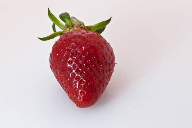 istock strawberry in close-up. 1253005112