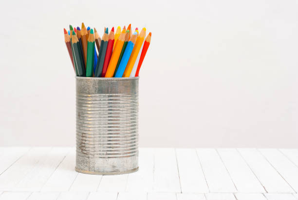 istock Colored pencils on wooden table 1253005889
