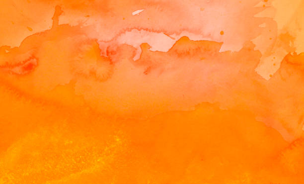 istock Orange watercolor bakground 1253007457
