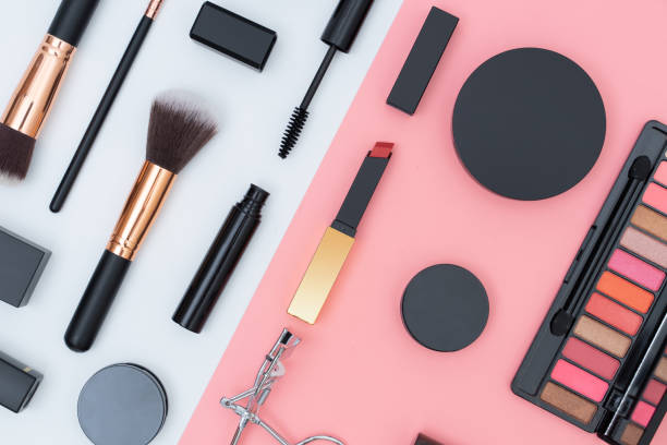 istock set decorative cosmetics on pink and white 1253012920