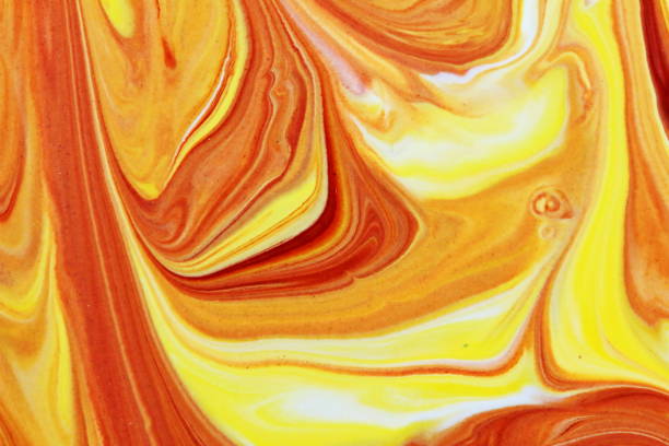 istock beautiful abstract mix red and yellow in close up 1253013950