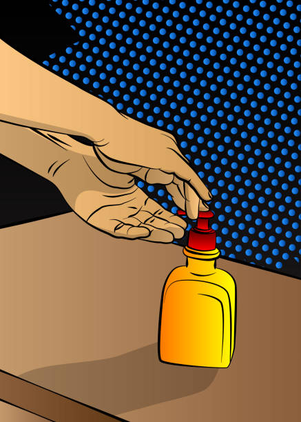 istock Man cleaning his hands with sanitizer gel. 1253015823