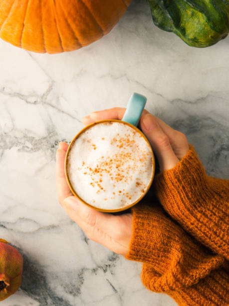 Autumn flat lay with mug of latte coffee