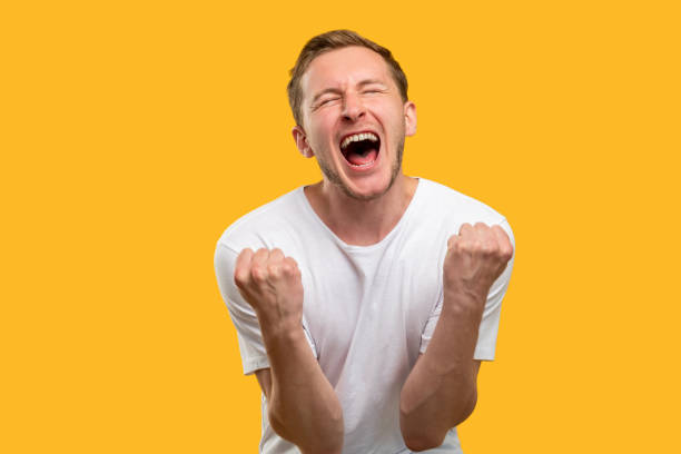 istock winner portrait success gesture excited man glory 1253016806
