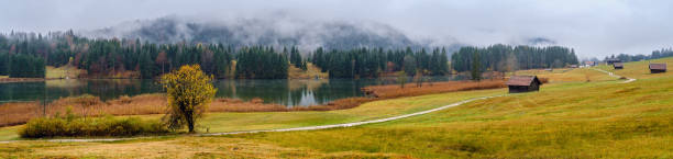istock Alpine autumn lake Geroldee or Wagenbruchsee, Germany 1253017540