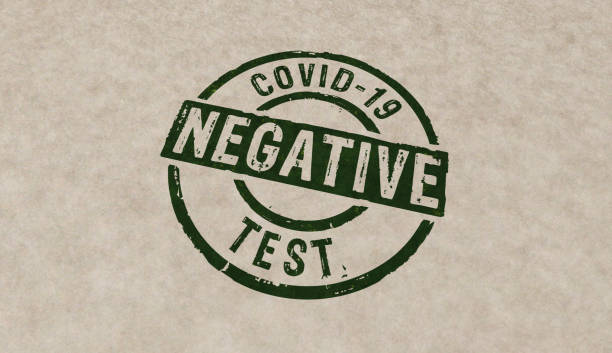istock Covid-19 coronavirus test negative stamp and stamping 1253017735