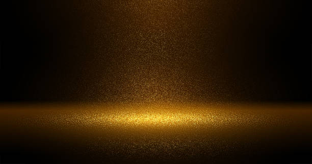 istock Luxury Gold glitter particles on black background. Golden glowing lights magic effects. Glow sparkles, vector illustration. 1253018703