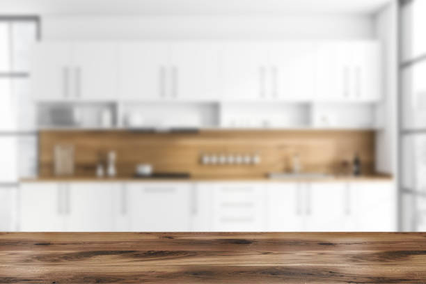 istock Table in white and wood kitchen with countertops 1253019739