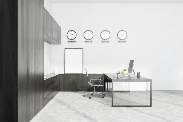istock White and wooden CEO office with clocks and poster 1253019982