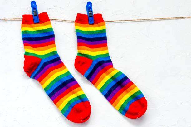 istock pair of rainbow-colored socks. Symbol LGBT 1253023793