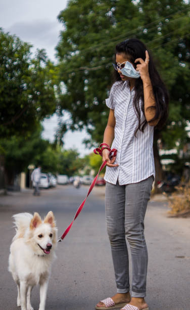 istock Girl with dog 1253025213
