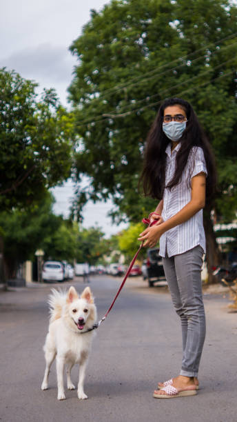 istock Girl with dog 1253025215