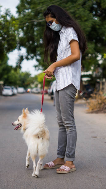 istock Girl with dog 1253025225