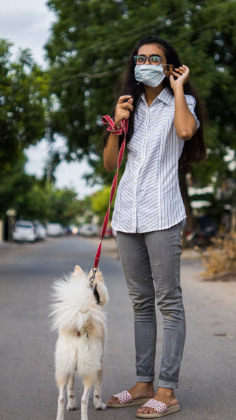 istock Girl with dog 1253025325