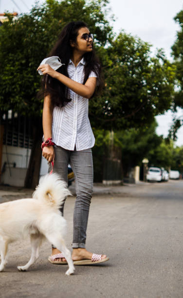 istock Girl with dog 1253025341