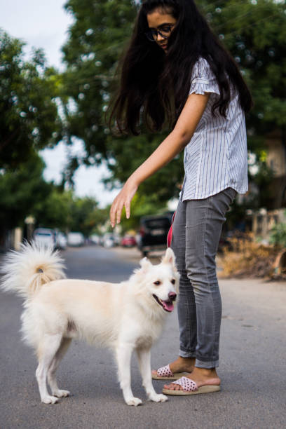 istock Girl with dog 1253025383