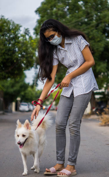 istock Girl with dog 1253025428