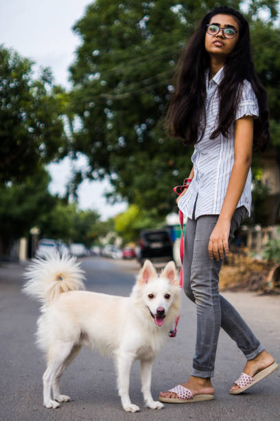 istock Girl with dog 1253025429