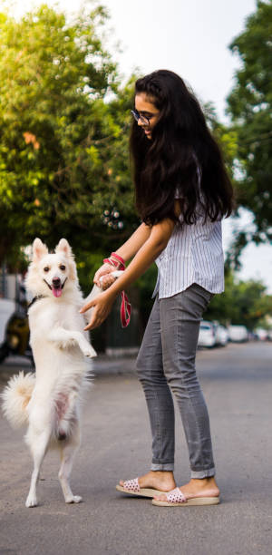istock Girl with dog 1253025563