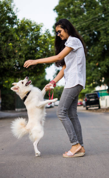 istock Girl with dog 1253025564