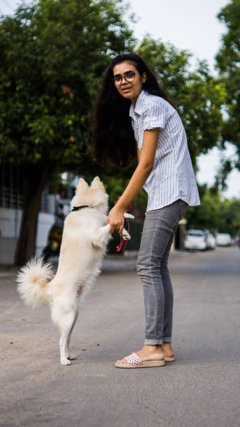 istock Girl with dog 1253026091