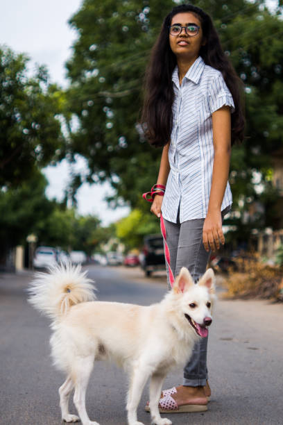 istock Girl with dog 1253026116