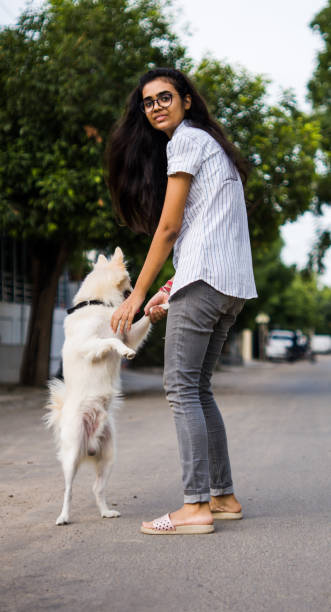 istock Girl with dog 1253026239