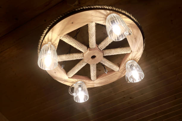 istock Wooden Wheel Chandelier 1253029037